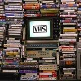 Книжная полка с VHS-кассетами
