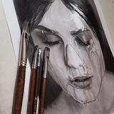 طراحی چهره سیاه قلم مهگل