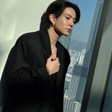 He has a handsome face but gives the impression of the being charismatic and firm. brown eyes and firm jaw also dominate