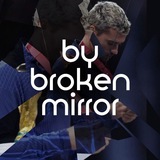 by broken mirror