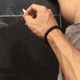 M.