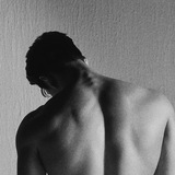 M.