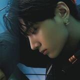 J.