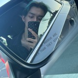 J.